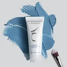 ZO® Skin Health Complexion Clearing Masque showing cream and a brush